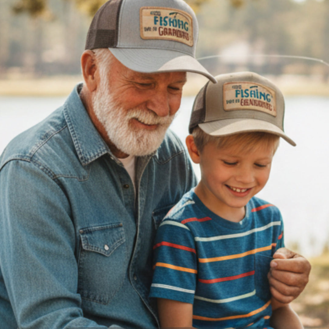 Grandpa and grandson wearing the Going Fishing cap, reading together